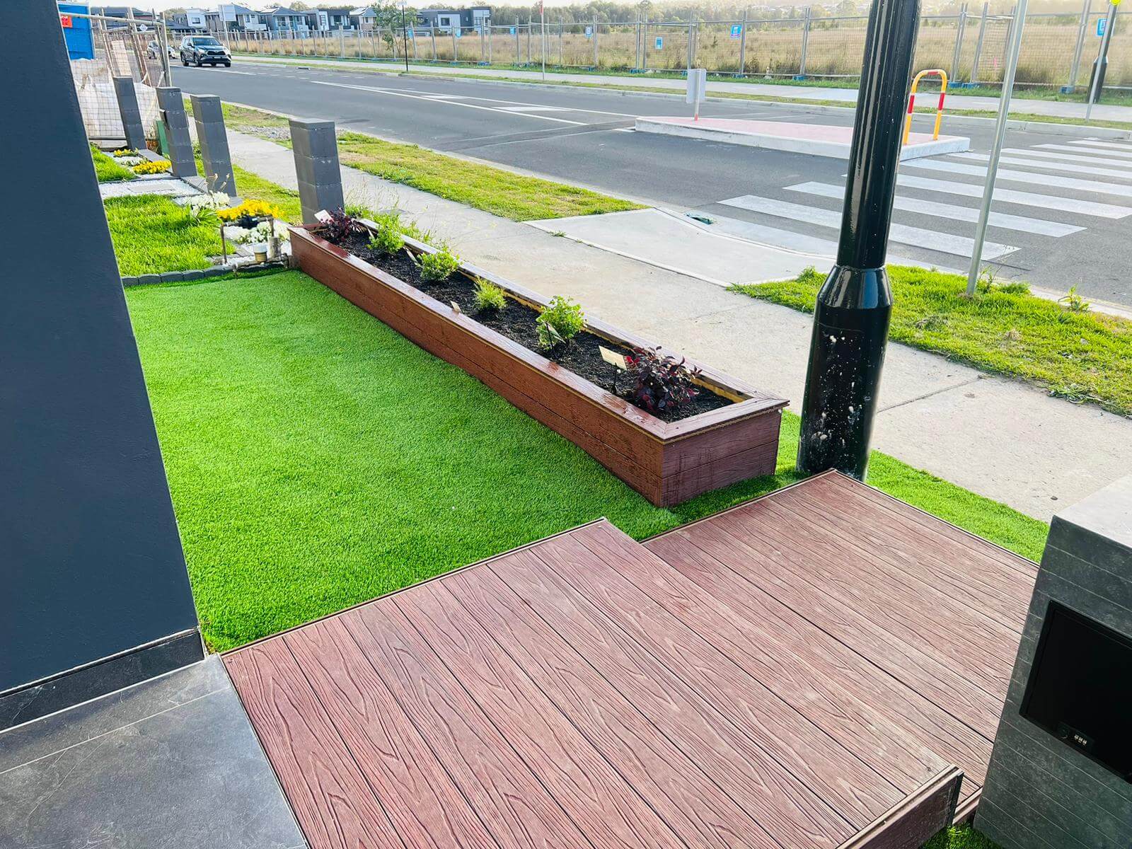 Modern garden water feature design and paving